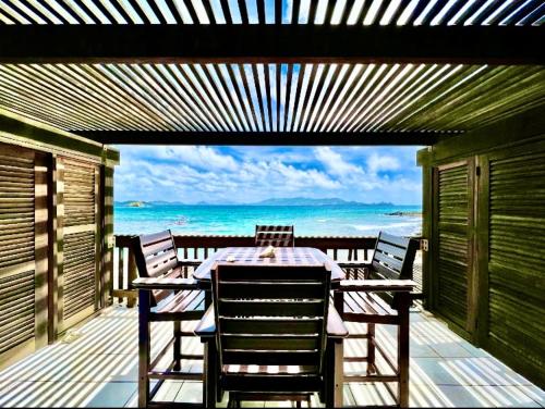 Sapphire Beach-Beachfront Condo SALE - View of Paradise in Red Hook