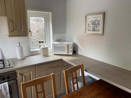 кухня, Clarkes 1st floor Apartment Leslie- Golf Paradies in Leslie
