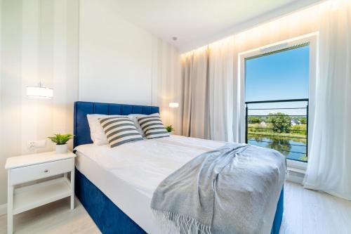 Belle View - 3pok, nawet 5 łóżek, piękny widok na rzekę, TV55 z Netflix i Max, parking, winda, Iława (foto 3)