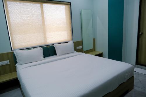 Hotel Sai Unity Room