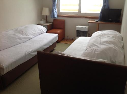 Twin Room with Private Bathroom - Non-Smoking