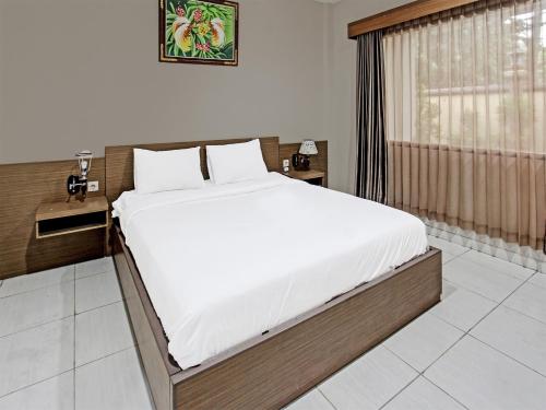 Capital O 91696 Kimara Homestay & Resto