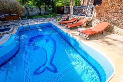 Villa Sarnıç-Fethiye Kayaköyde Havuzu Korunaklı - image 2