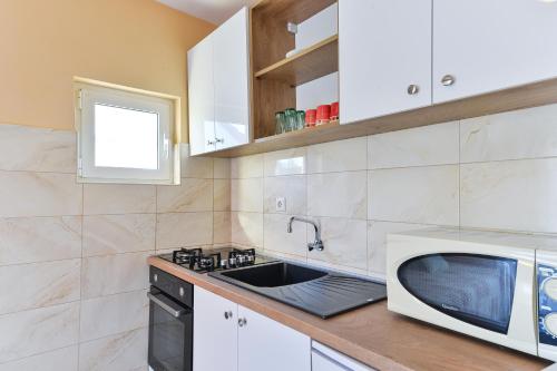 One-Bedroom Apartment with Balcony and Sea View image 10