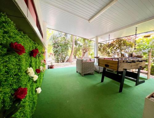 gedeelde lounge/tv-ruimte, Va'a i te Moana in Rangiroa