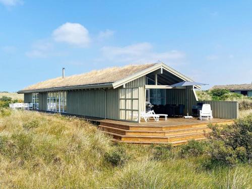 10 person holiday home in L kken