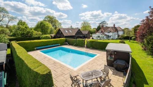 6 Bed Mansion With Tennis Court & Swimming Pool in Leatherhead