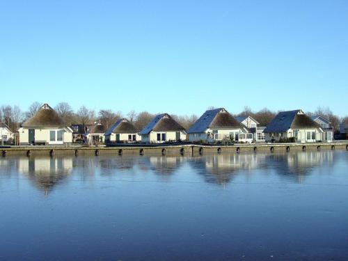 Attractive holiday home with jetty