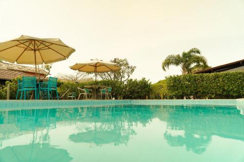Swimming pool, Pousada Dunasol Floripa near Morro da Lagoa