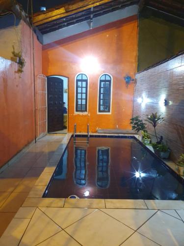 Casa com piscina para temporada em Praia Grande