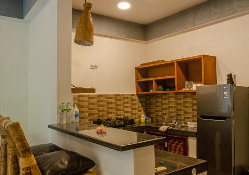 Kitchen, Senggigi Homes & Apartments near Nipah Beach