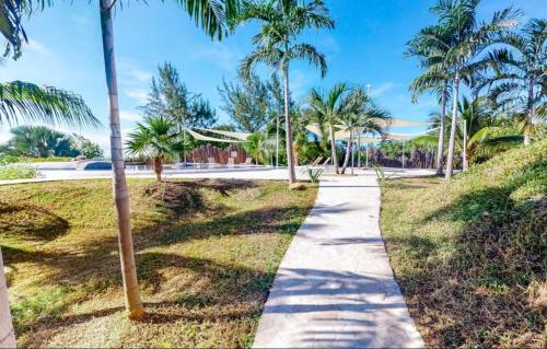 Uitzicht, Alterhome Swan villas with swimming pool and ocean views in Maya Beach