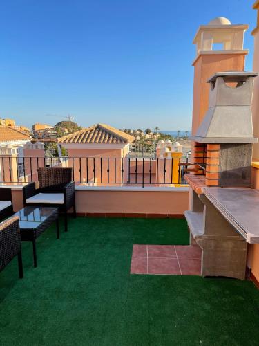 Erkély/terasz, Adosado playa, geoda y Aguilas cerca, con barbacoa y piscina en San Juan de los terreros in Pulpí