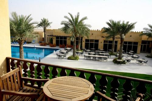 Exterior view, Al Hamra Village Hotel in Beachfront