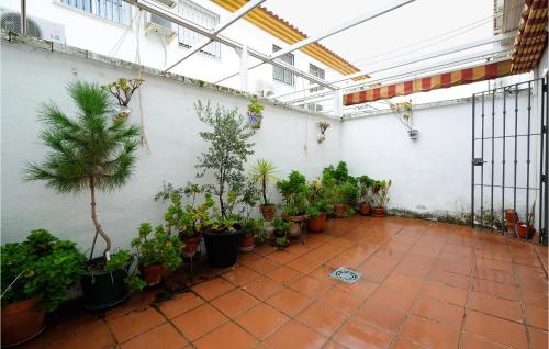 3 Bedroom Cozy Home In La Algaba - Tap to explore photos