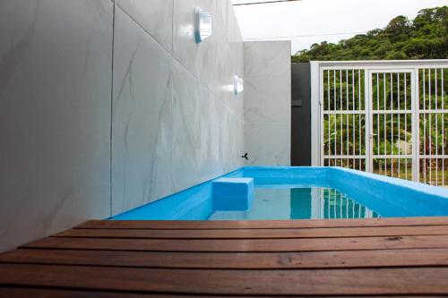 AG - BRUNO KLEMTZ - CASA INDIVIDUAL CoM PISCINA, AR, WI-FI, ATÉ 16 PESSOAS BRUNO KLEMTZ, Itapema