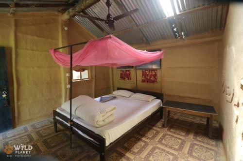 Guestroom, Wild Planet Eco Retreat in Thakudwara