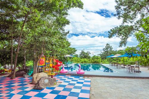 Swimming pool, Hoi An Hotel - Suoi Luong - Hai Van Park in Hoa Hiep Bac
