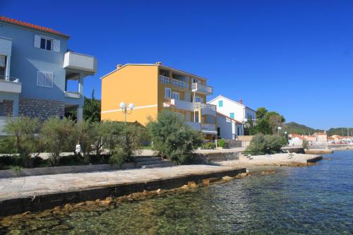  Apartments by the sea Preko, Ugljan - 8384, Pension in Preko