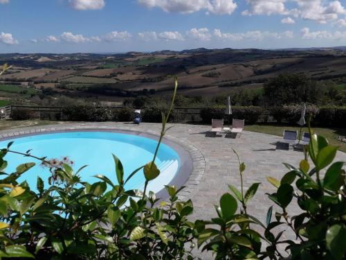 Swimming pool, Romantic Apartment in Mombaroccio with Swimming Pool in Mombaroccio