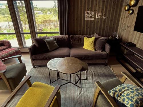 Unique cabin with fantastic lake view, sauna, ski & EV outlet in สวิงวูลล์