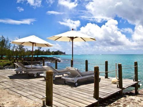 Hibiscus Boutique Hotel Set in a prime location of Mauritius Island, Hibiscus Beach Resort and Spa puts everything the city has to offer just outside your doorstep. The property features a wide range of facilities to make yo