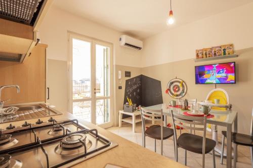 virtuve, Babyaccommodation Family Garden in Borgio Verezzi
