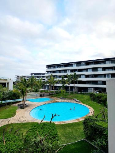 Swimming pool, Sugar Shores - Studio Apartment in Umdloti