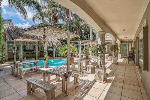 陽台/露台, 哈特貝斯特可可莫俱樂部酒店 (Club Cocomo Hartbeespoort) in 哈特比斯普特