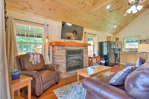 Deck & Hot Tub: Bryson City Riverfront Cabin!