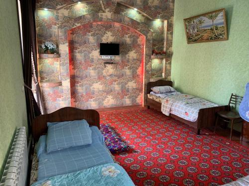 Muharram Homestay in the neighborhood of the Registan Square, 家族 ゲストハウス