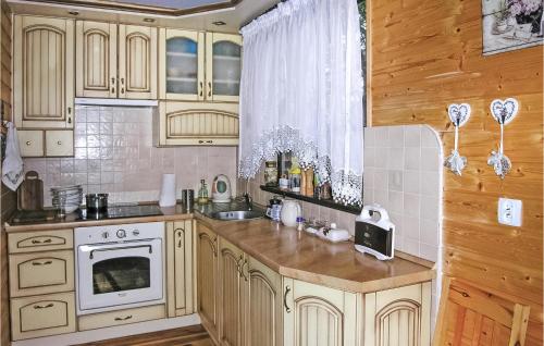 Amazing Home In Molza With Kitchen