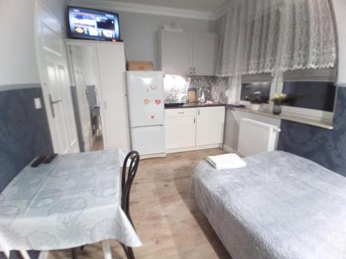 Studio Jutrzenka z łazienką by Apartamenty na dni Wrocław, Wrocław (photo 9)
