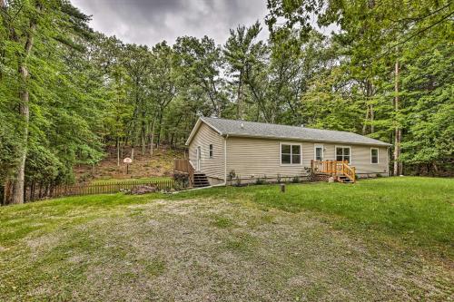 Charming Pentwater Home with Fire Pit and Yard!