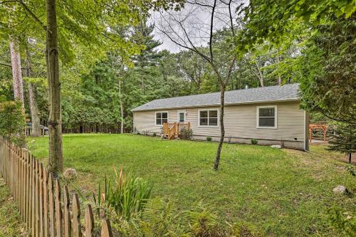 Charming Pentwater Home with Fire Pit and Yard!