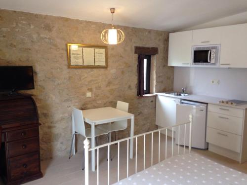 廚房, Apartaments Fonda Comerc in 托羅埃利亞