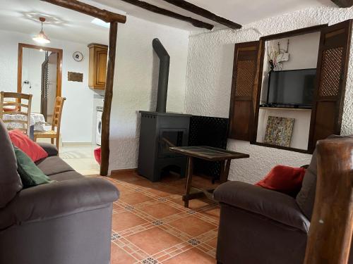 Koplietošanas atpūtas telpa ar TV, Casa Pepo in Pampaneira
