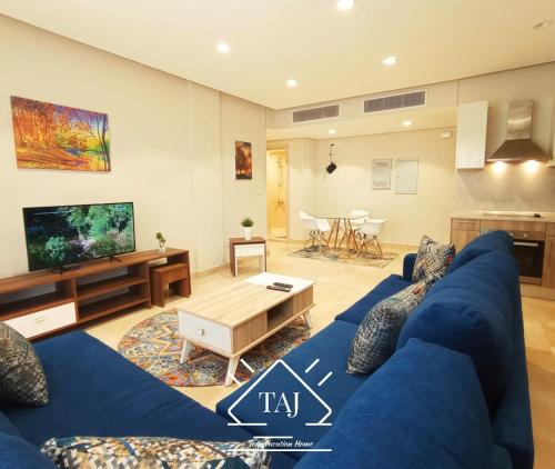 Taj Home ,cozy mangroovy 2BR apartment..pool&Beach access