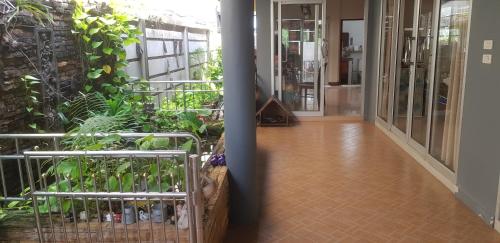 Sisäänkäynti, Pakin house in Nuea Klong