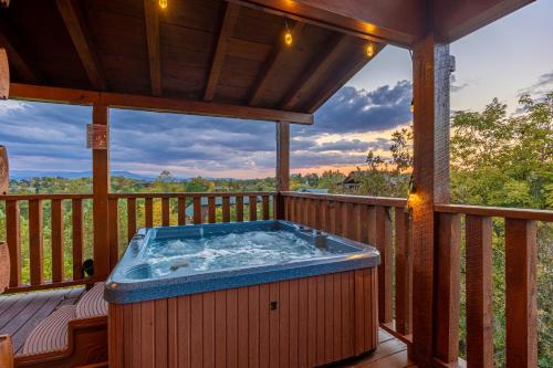 Luxurious 6BR Smoky Mountain cabin with stunning views game room fire pit and hot tub Wi-Fi - image 3