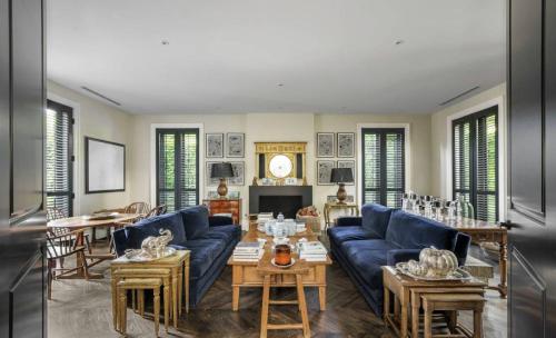 A stunning kitchen featuring marble bench tops