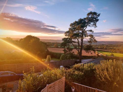 Our beautiful large Suite room with a Double bath with Shower ensuite - It has a full Kitchen boasting stunning views over the Axe Valley - Only 3 miles from Lyme Regis, River Cottage HQ & Charmouth - Comes with free private parking - Apartment - Axminster