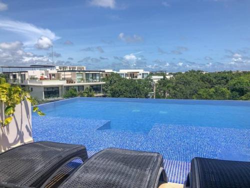 Exclusive building kingsize bed 2 super pools, gym, grill in Tulum, Mexiko