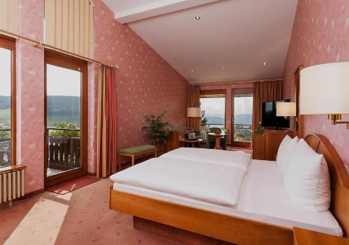 Junior Suite with Two Balconies with Access to Indoor Pool