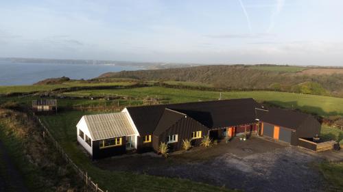 Funky, family-friendly five bed beach house on cliff looking over Tenby, Pendine, Pembrokeshire