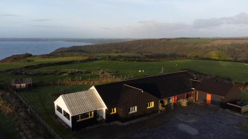 Funky, family-friendly five bed beach house on cliff looking over Tenby, Pendine, Pembrokeshire