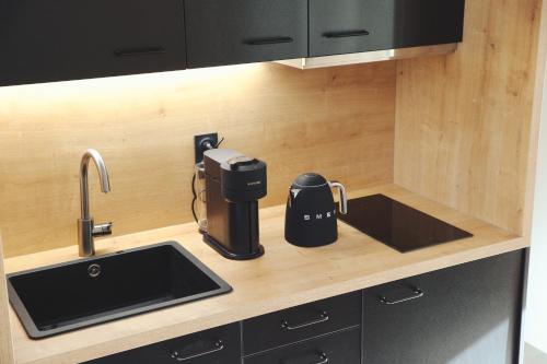 Konyha, La maison Balinaise in Neuville Bosc