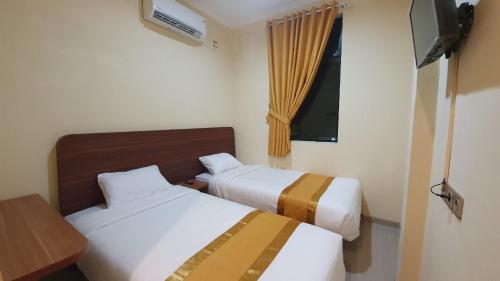 Harmony Inn Belitung - City Hotel Room Type - Standard Twin Room