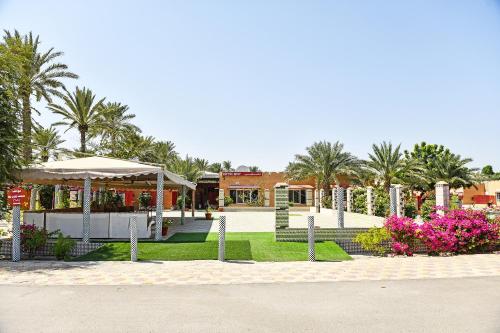 trädgård, OYO 138 Gulf Sand Motel in Muladdah