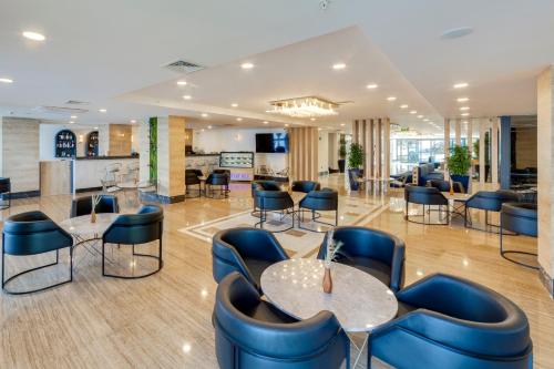 Спільний лаунж/ТБ зона, Signature Blue Resort Kuşadası (Signature Blue Resort Kusadası) in Кушадаси